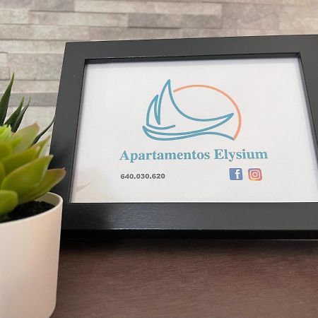 Apartamentos Elysium ตอร์เรโมลิโนส ภายนอก รูปภาพ