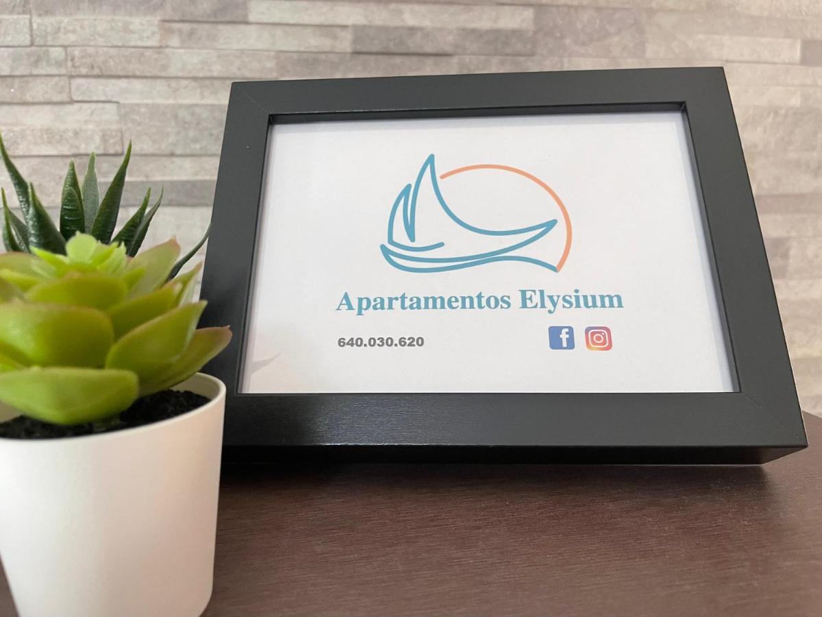 Apartamentos Elysium ตอร์เรโมลิโนส ภายนอก รูปภาพ